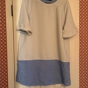 Doe Rae dress with Light Blue Hem.  Ruffle sleeves.